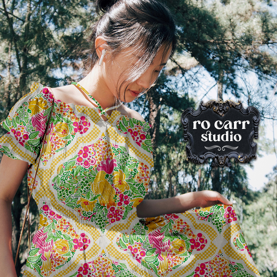 Woman wearing peasant style dress, displaying fabric design Preppy Palm Beach Garden Party