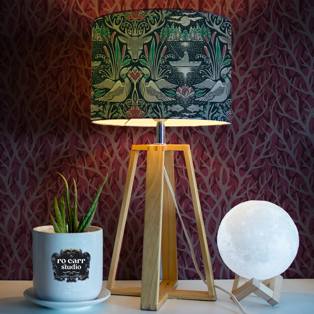 Mockup of lamp shade and wallpaper printed with seamless patterns.