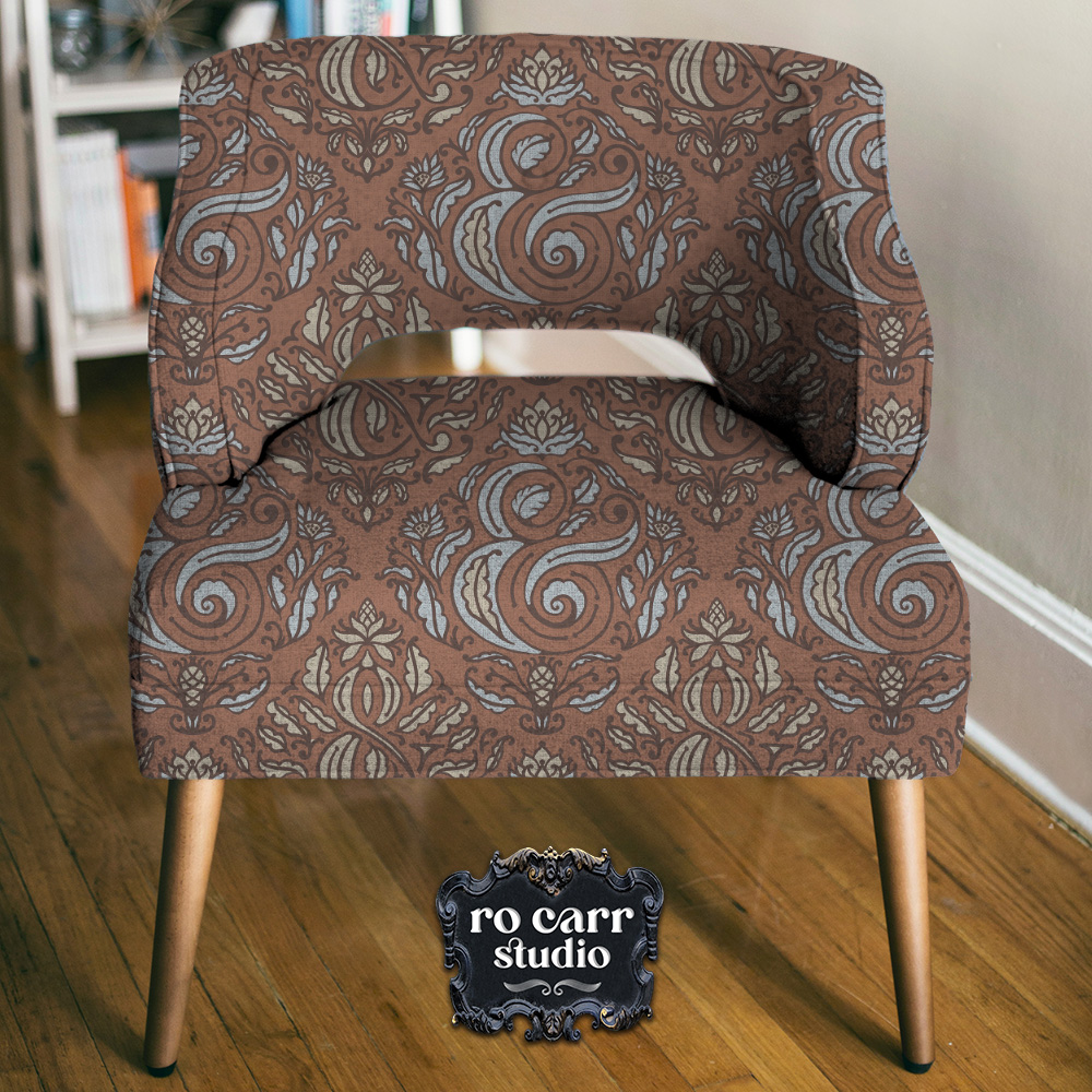 Mockup of occasional chair upholstered with Ampersand Damask.