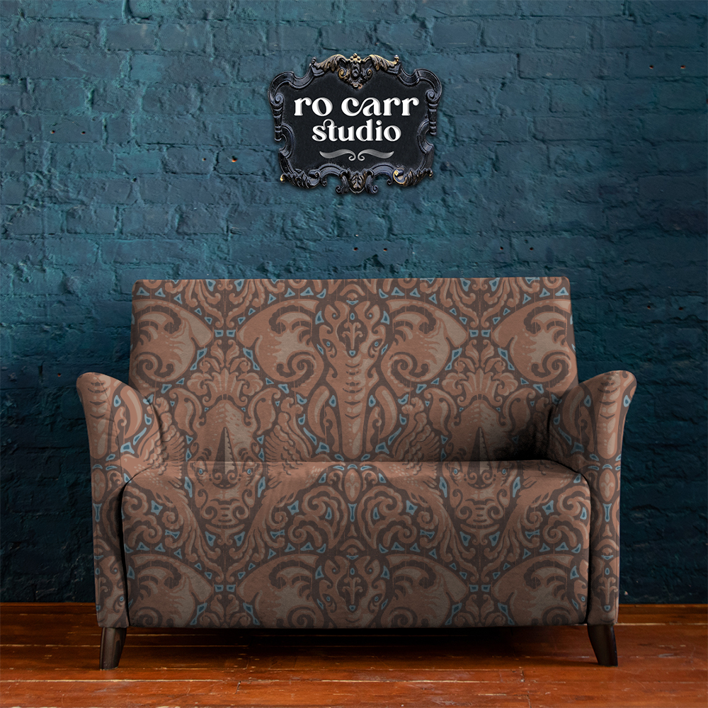 Loveseat upholstered with Kalahari Safari damask.