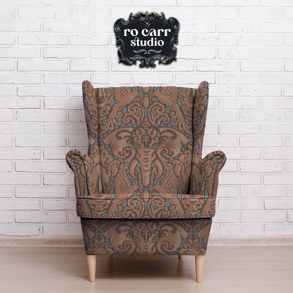 Wingback armchair upholstered with Kalahari Safari damask.