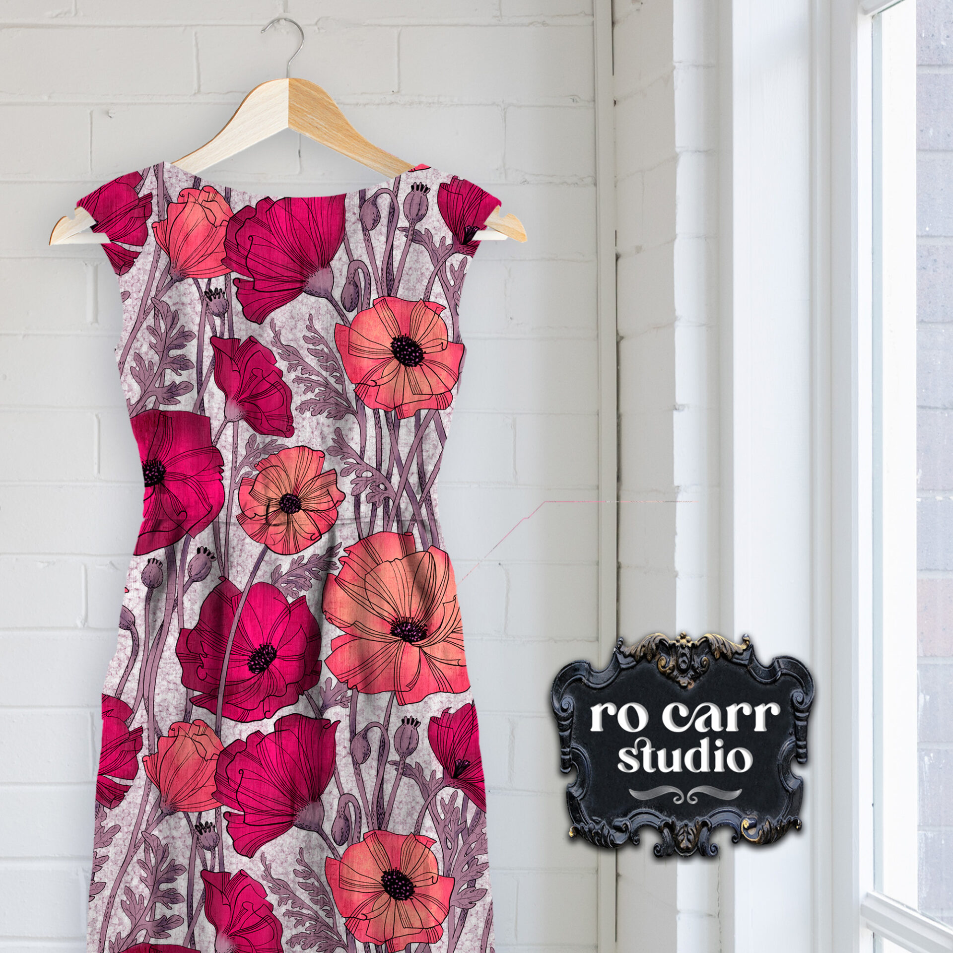 A Tangle of Poppies design shown in a mock up of a shift dress on a hanger.