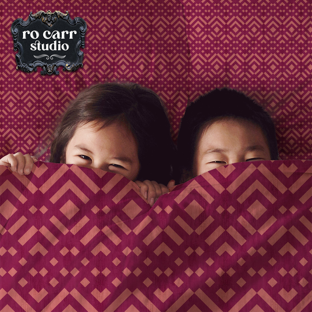 Zig Zag Trellis pattern shown in a bedding mockup with two cute kids.