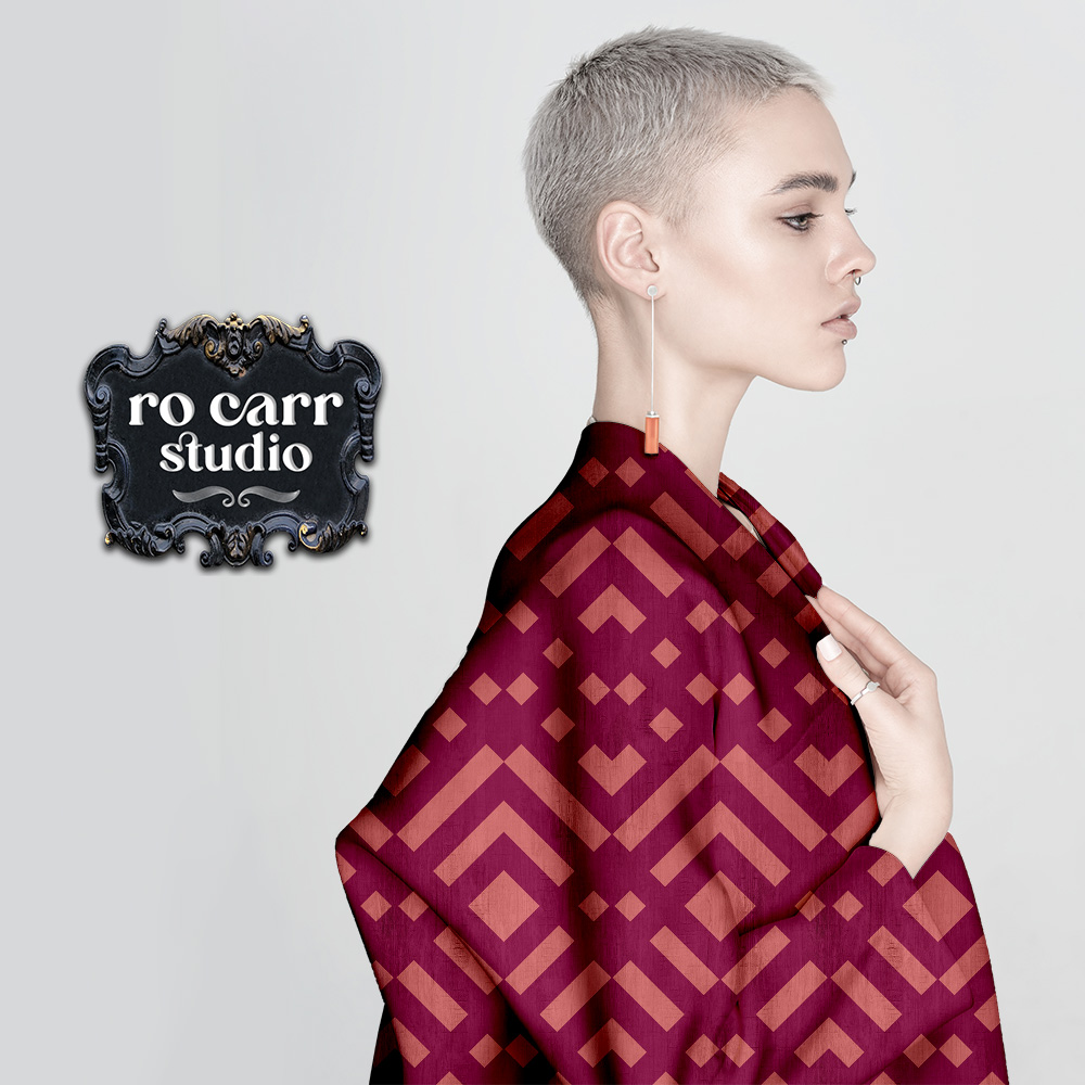 Mockup of woman wearing a look wrap coat made from the zig zag patterned fabric.