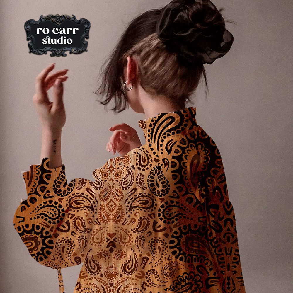 Leopard paisley fabric shown as ladies blouse.