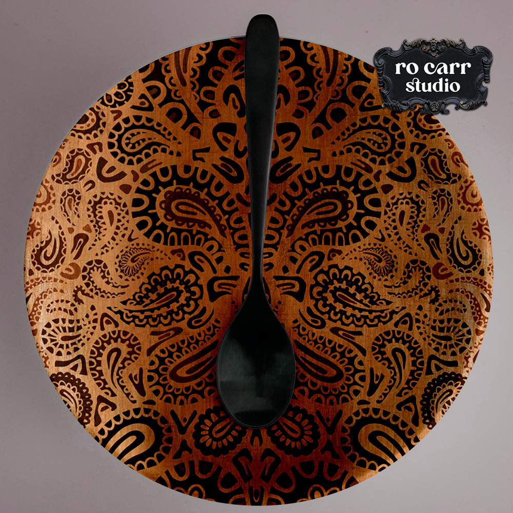 Leopard paisley pattern printed on a dinner plate.