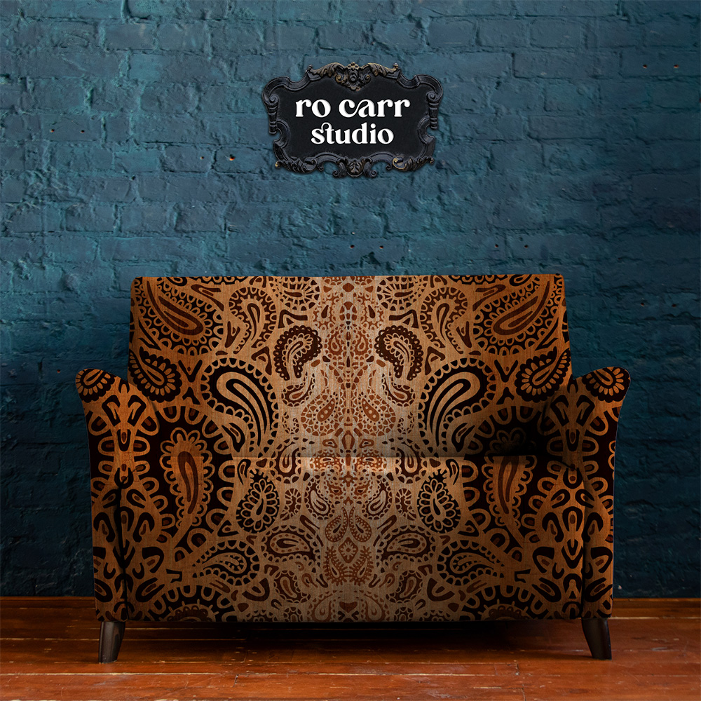 Leopard paisley pattern shown as upholstery on a love seat.