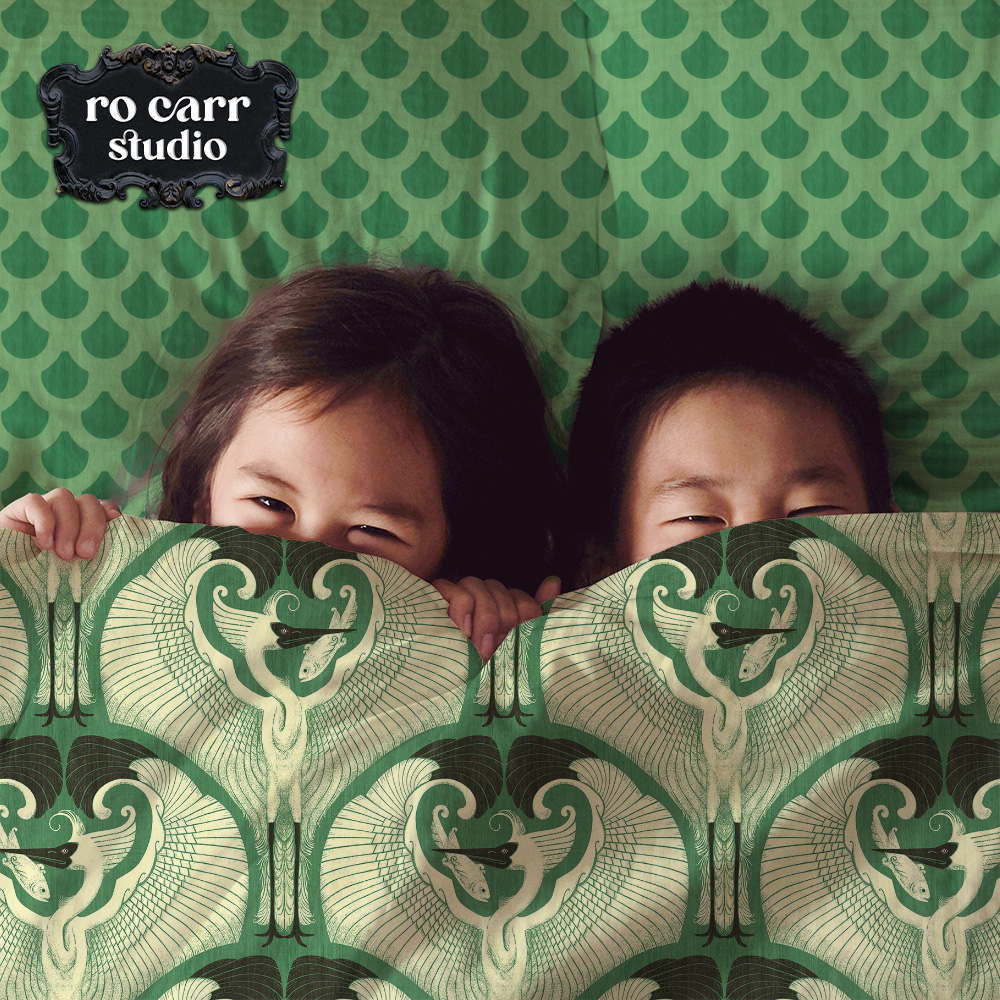 Bedding mockup of two cute kids under the covers printed with the great egret pattern.
