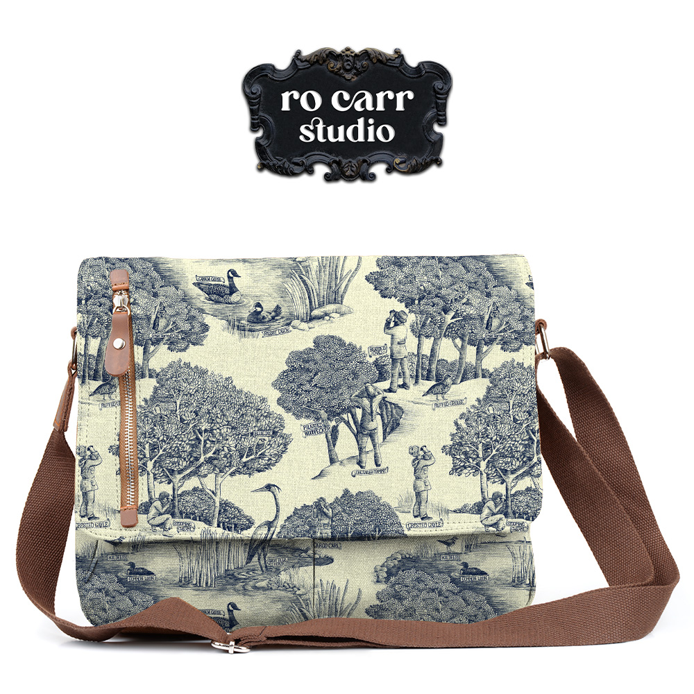 Toile de Jouy pattern with a birdwatching theme, mocked up as a cross body bag.