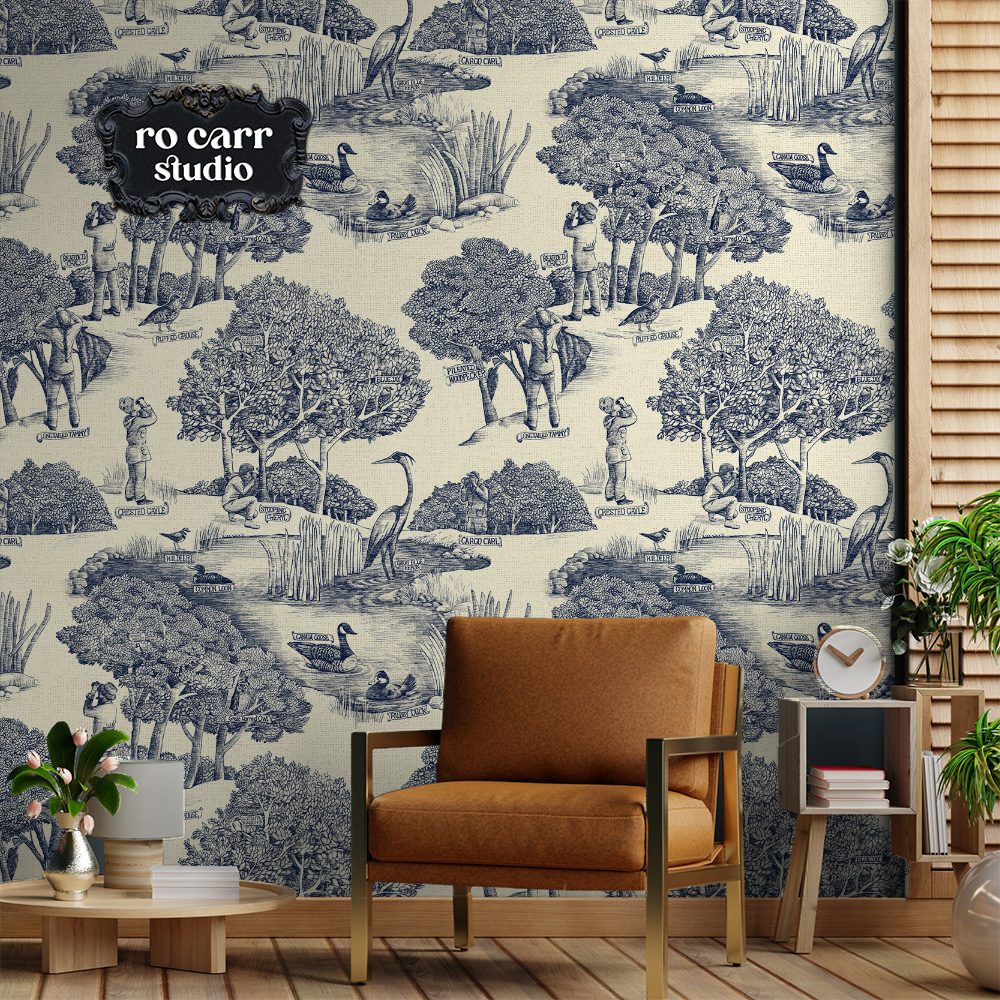 Toile de Jouy pattern with a birdwatching theme, shown in this mockup as wallpaper in a sitting room.