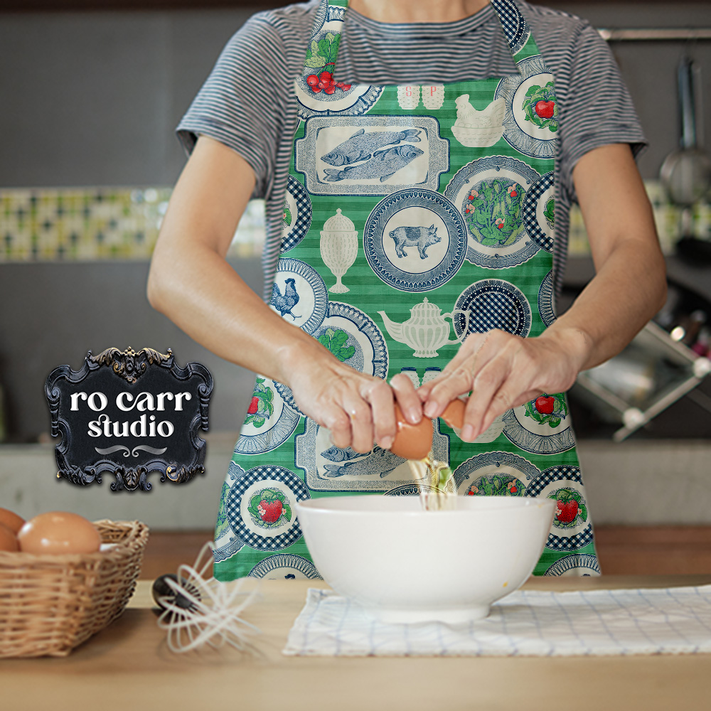 Mockup of woman baking in a kitchen wearing an apron printed with the featured design.