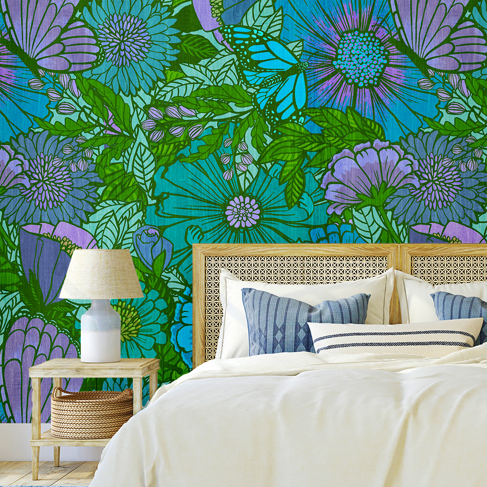 Wallpaper mockup showing a bedroom with the bright floral on the wall in the background.