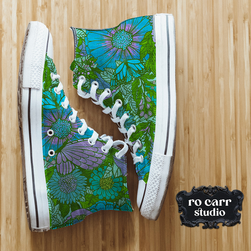 High top sneakers printed with the electric floral pattern.