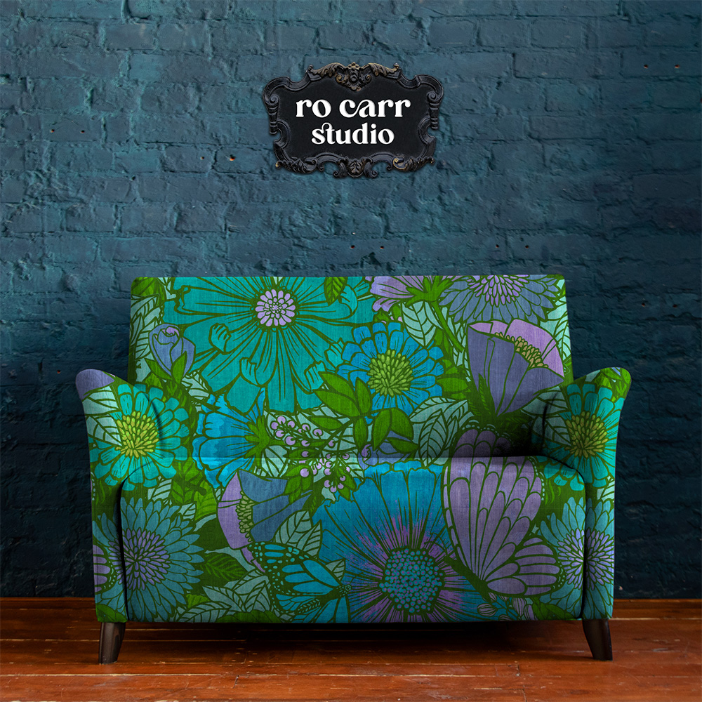 Upholstery mockup showing the floral pattern in a love seat.