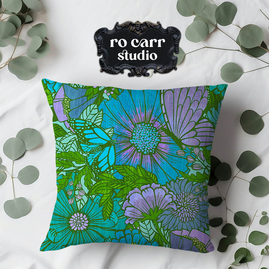 Mockup of a throw pillow made from the electric floral fabric.