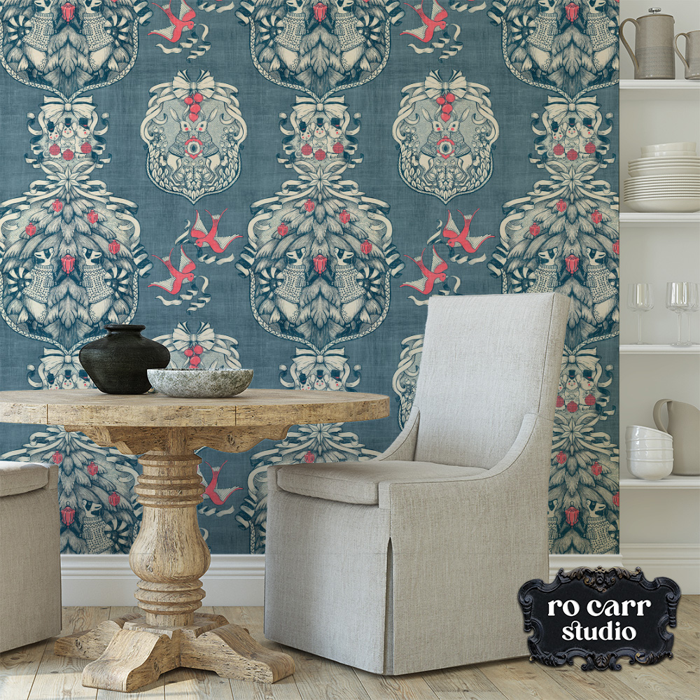 Christmas toile de jouy pattern shown as wallpaper in a dining room.