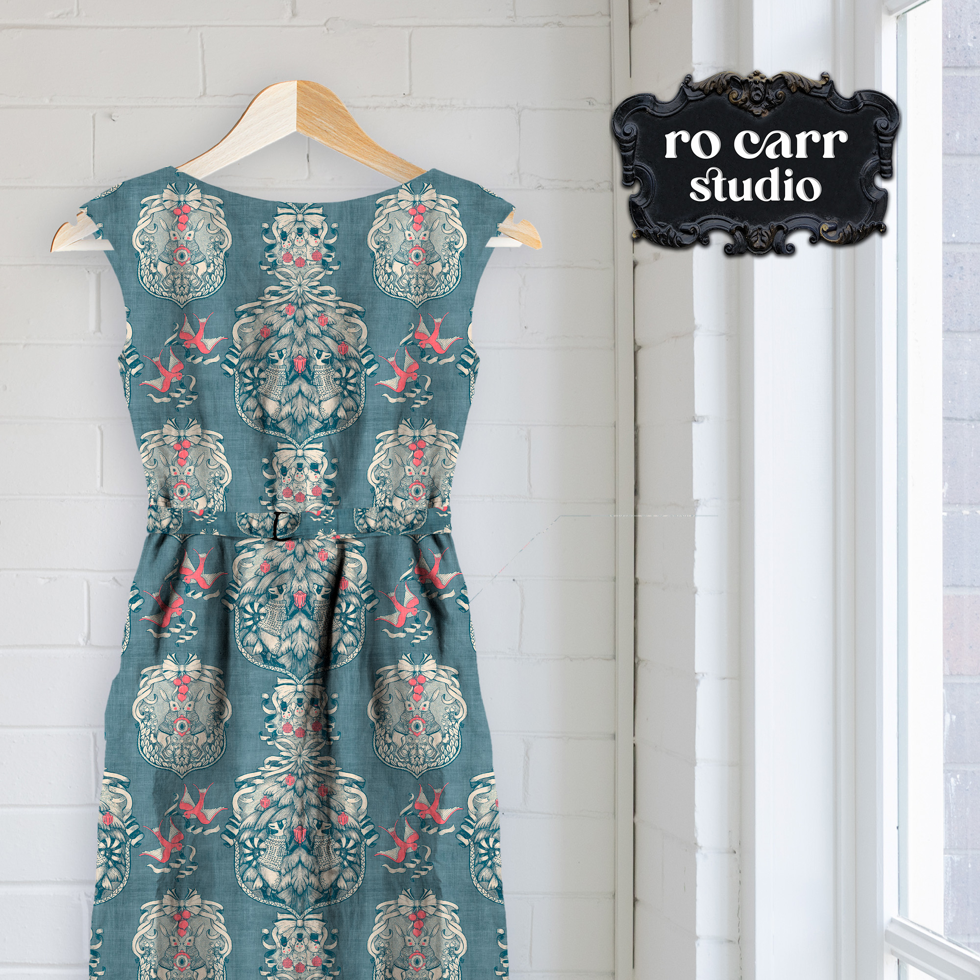 Shift style dress shown on a hanger, mocked up using the toile fabric.