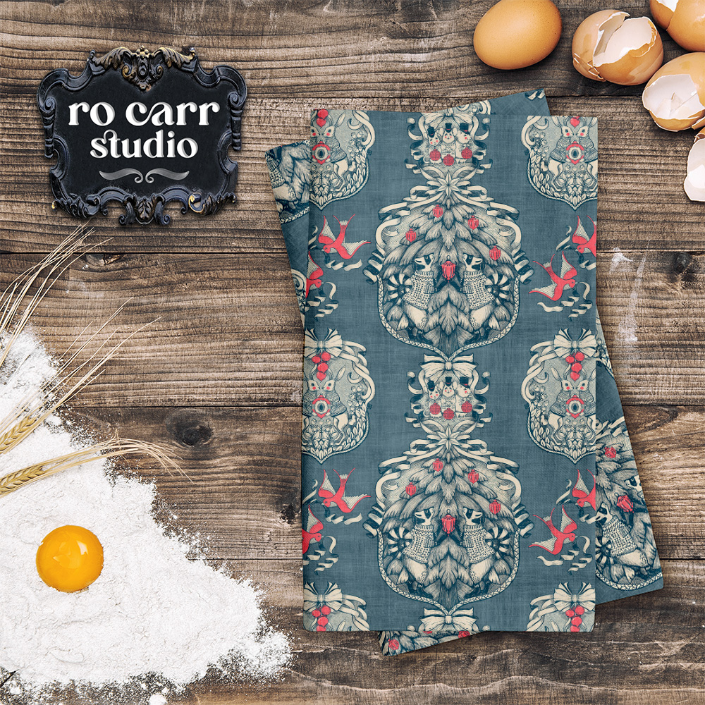 Toile pattern shown in a kitchen scene, mocked as cloth napkins.