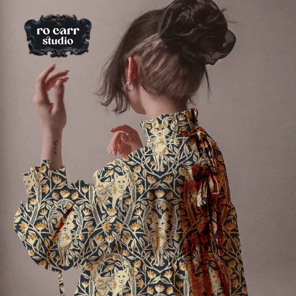 Mockup of blouse printed with the hunt club fabric, worn by a stylish young woman seen from the back.