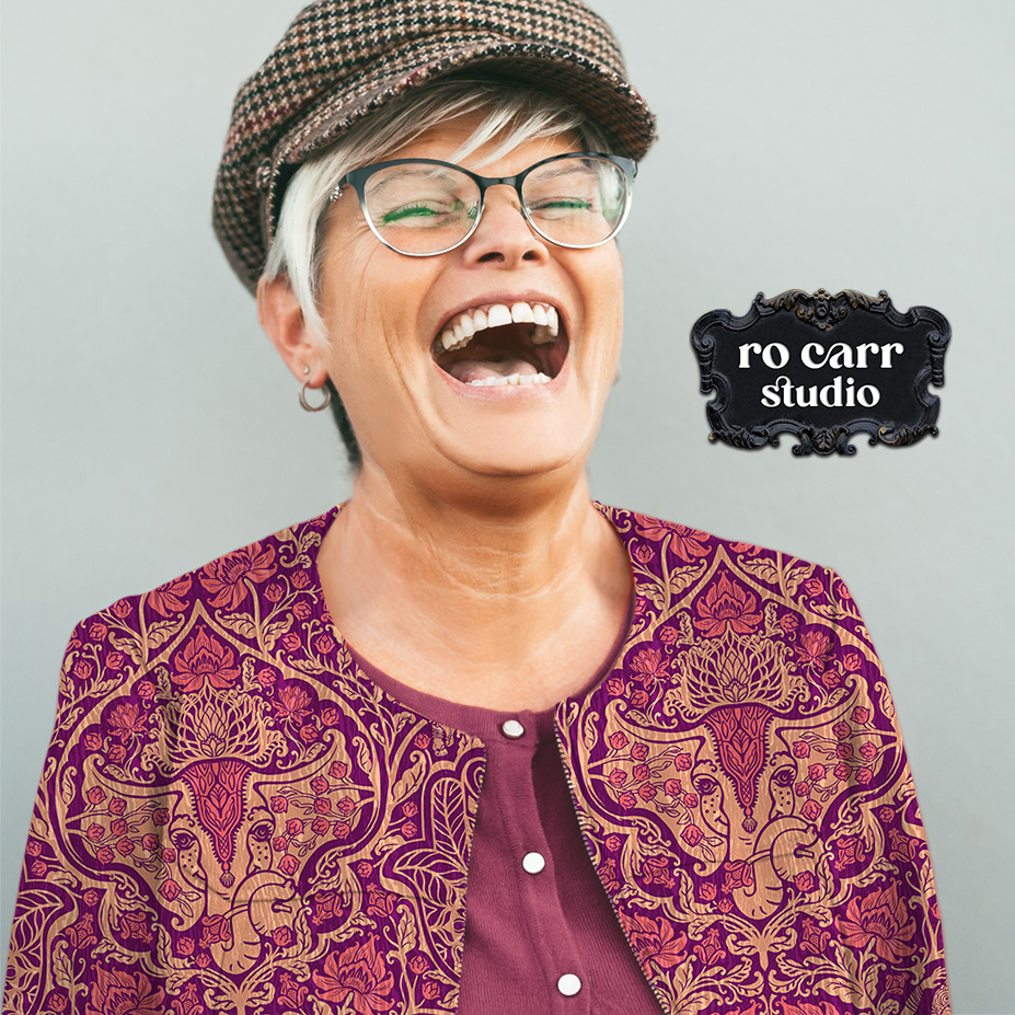Woman with a big laugh, wearing a jacket printed with the pattern in amethyst.