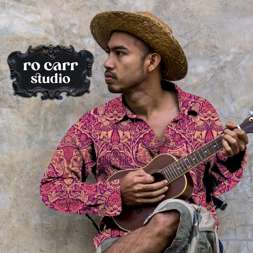 Mockup showing a young male musician playing a ukulele, wearing a shirt printed with the Garden of Mirthly Delights pattern in amethyst.