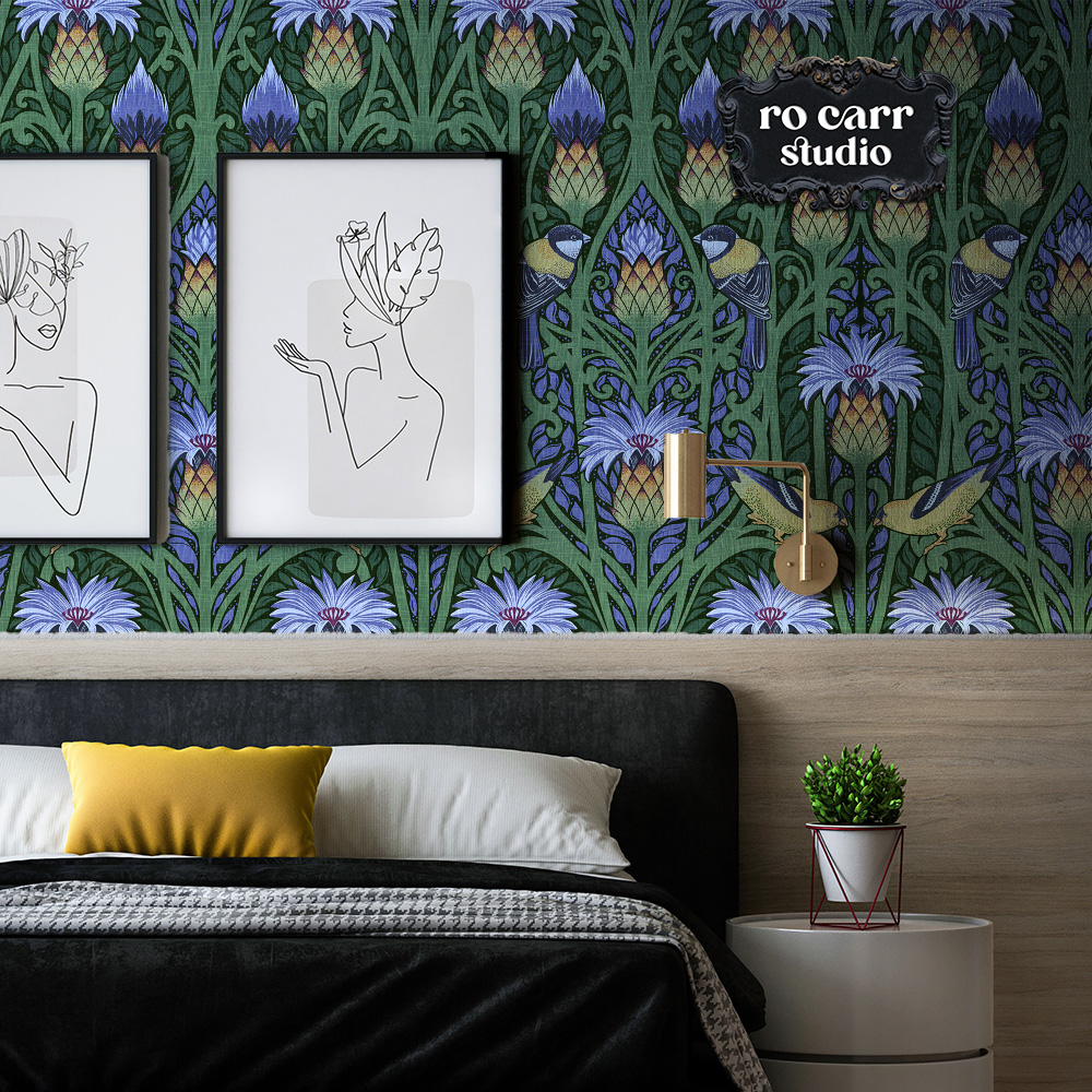 Nouveau blue repeating art nouveau pattern mocked up as wallpaper in a cosy bedroom scene.