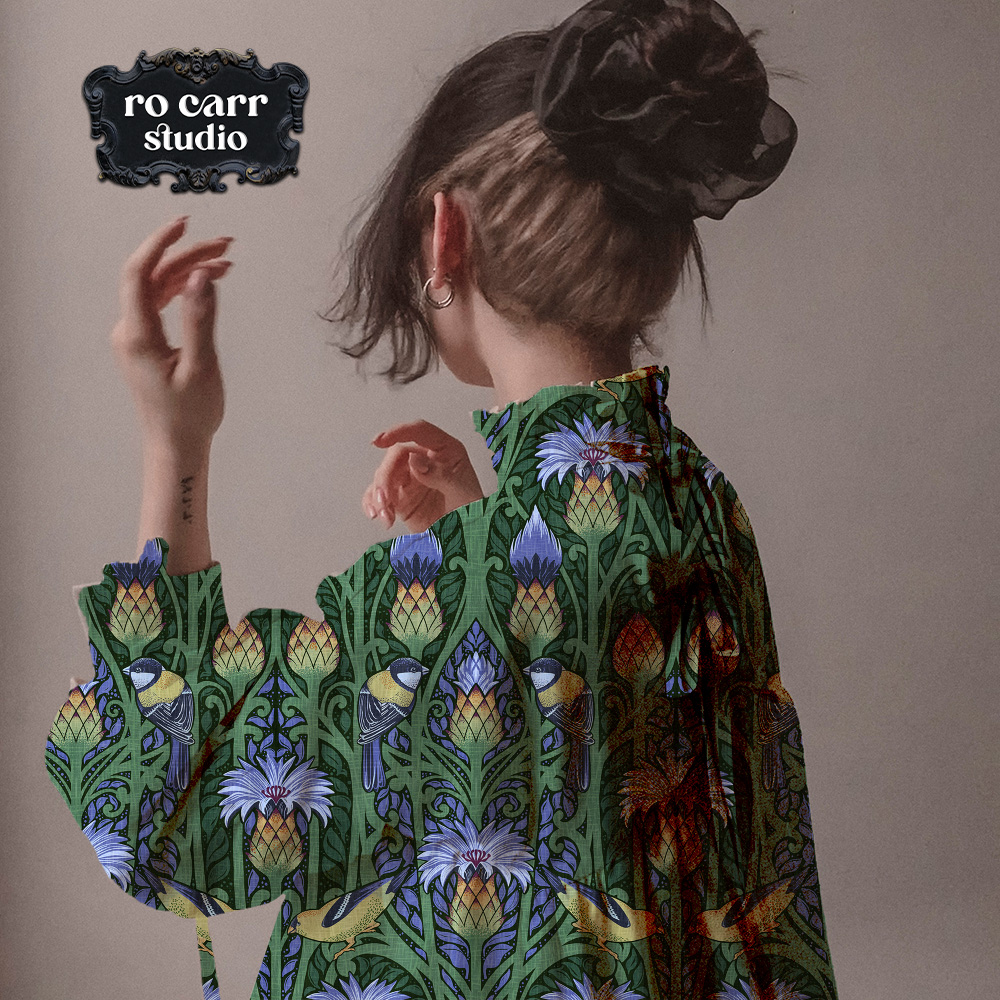 Repeating pattern mocked up as a flowy blouse worn by a young woman with her head turned away.