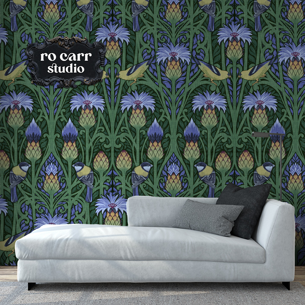 Nouveau blue repeating pattern mocked up as wallpaper with a gray chaise lounge in the foreground.