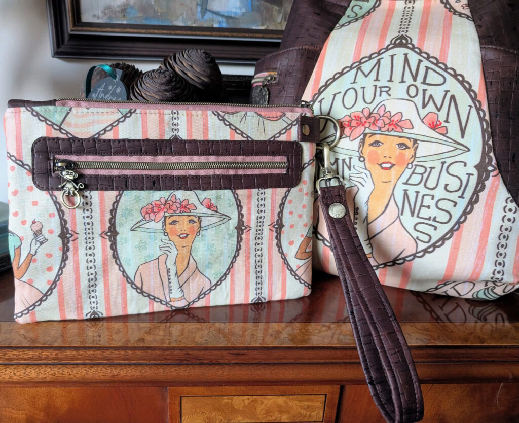 Two hand made bags using grandmillennial and mind your own business prints.