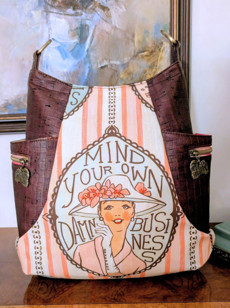 Hand made tote bag with "Mind Your Own Business" print.