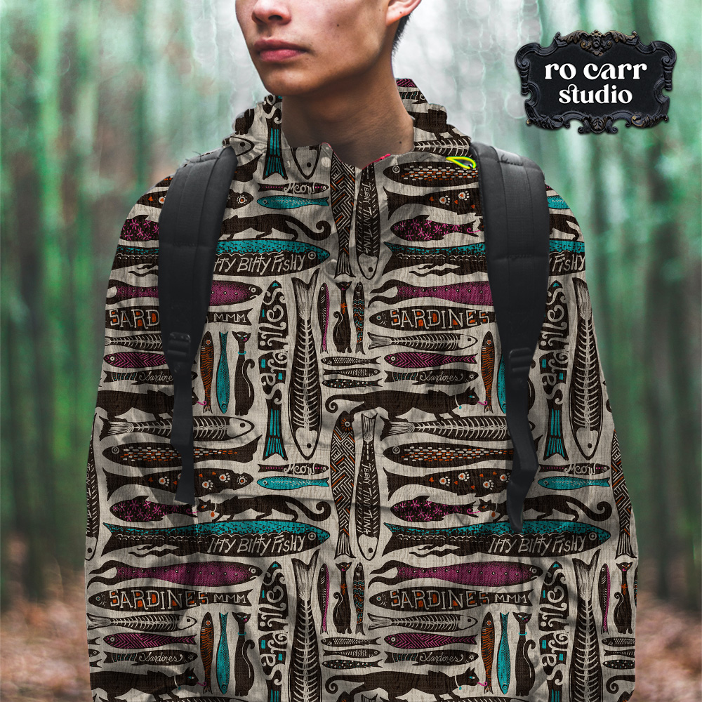 Mockup of a sporty anorak style jacket on a young man in the woods, the jacket is printed with the pattern.