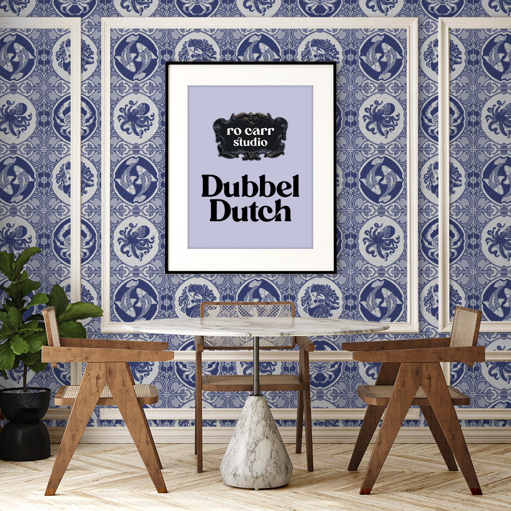 Dining room photo with framed walls featuring dubbel dutch wallpaper and a Ro Carr Studio branded sign.