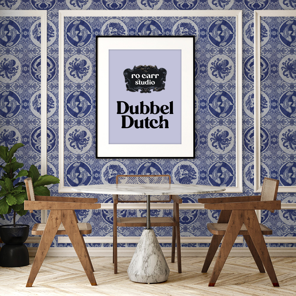 Dining room photo with framed walls featuring dubbel dutch wallpaper and a Ro Carr Studio branded sign.