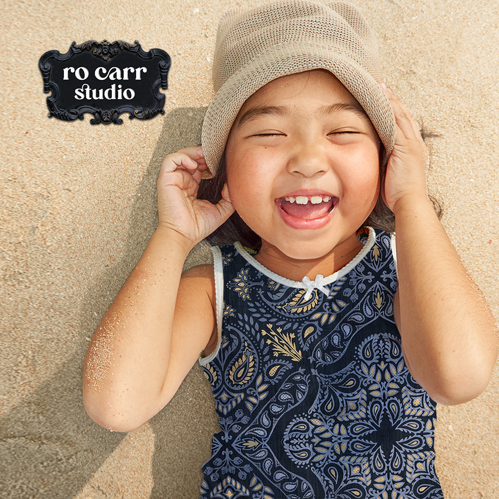 Child wearing a sleeveless top featuring the Retro Country Bandana pattern.