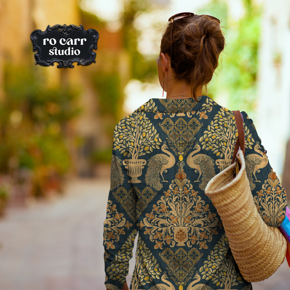Woman from behind wearing a Tapestry Fiorentina long-sleeve top on a sunlit Italian street.