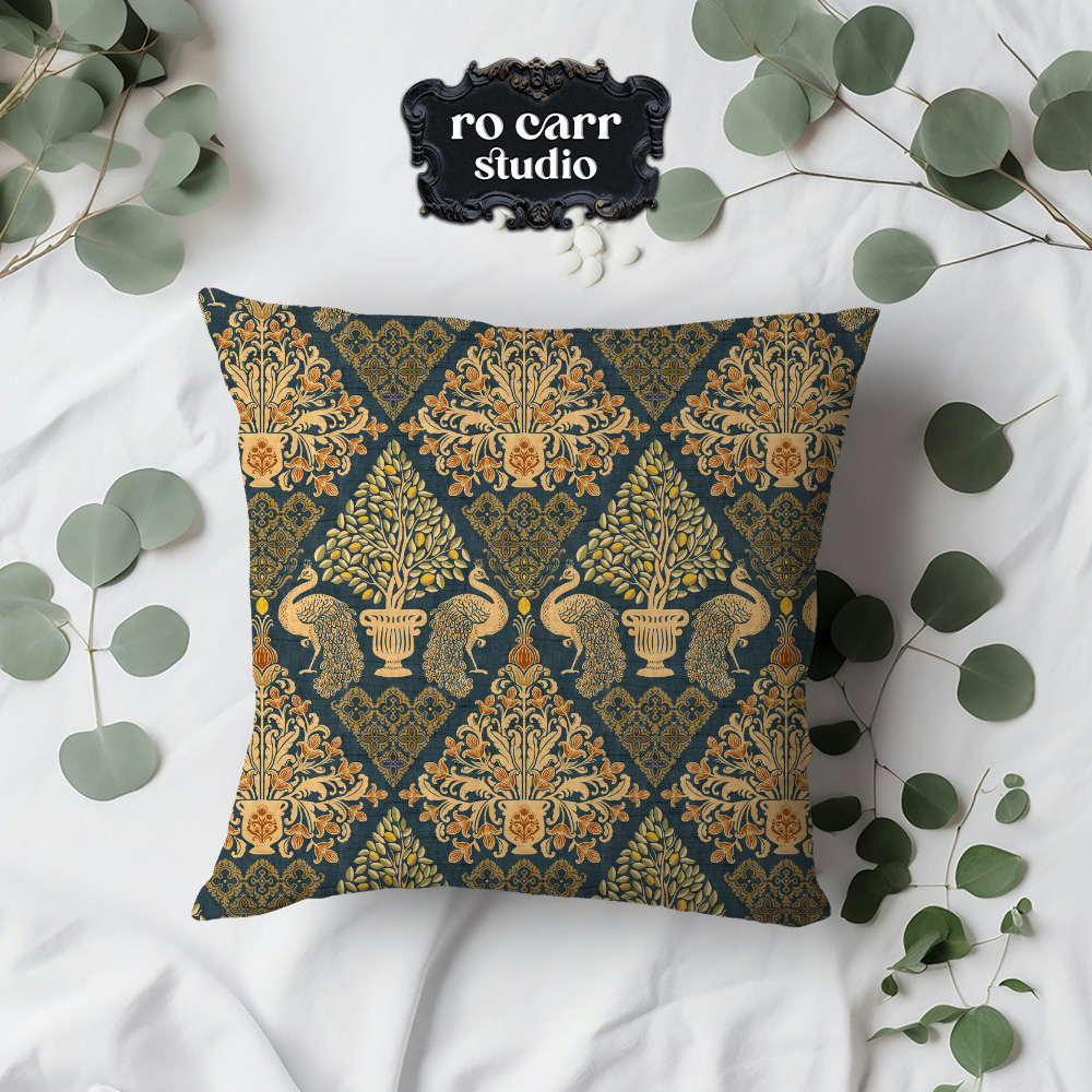 Tapestry Fiorentina pattern on a square throw pillow with eucalyptus sprigs.