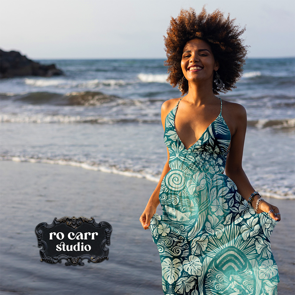 Eat, Pray, Swim surface pattern design mockup on a maxi dress, worn by a woman walking on the beach.