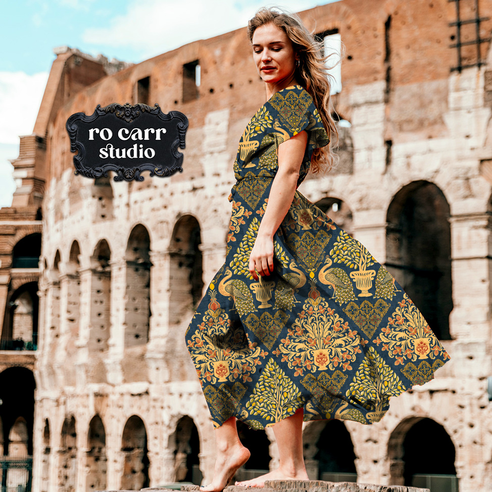 Woman in a flowing Tapestry Fiorentina dress walking in front of the Colosseum, Rome.