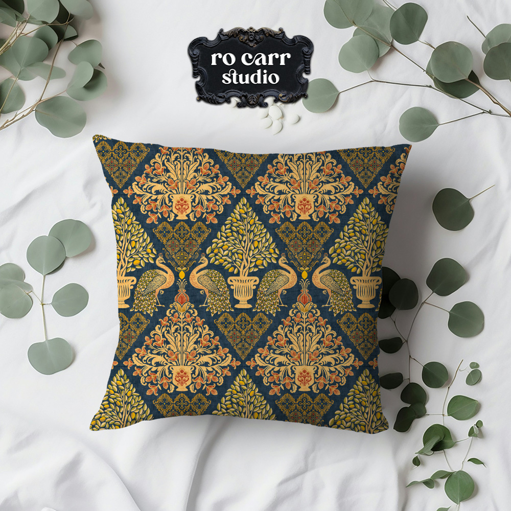 Tapestry Fiorentina pattern on a square throw pillow with eucalyptus sprigs.