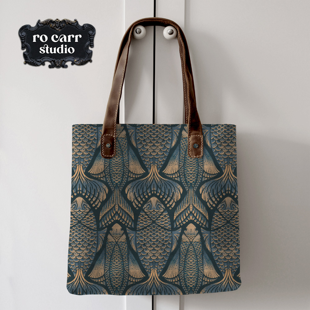 The Real McKoi tote bag with leather handles on a white wall.