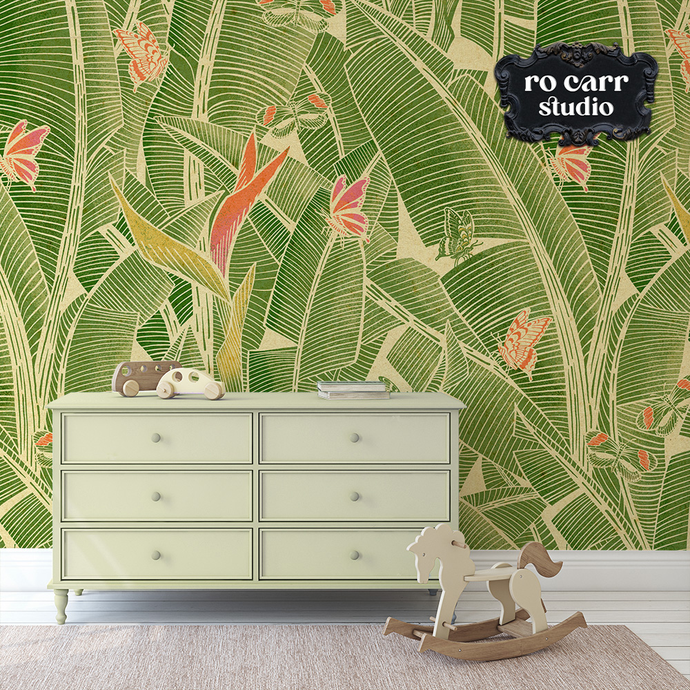 Goodnight Jungle wallpaper in a nursery with a white dresser and wooden rocking horse.