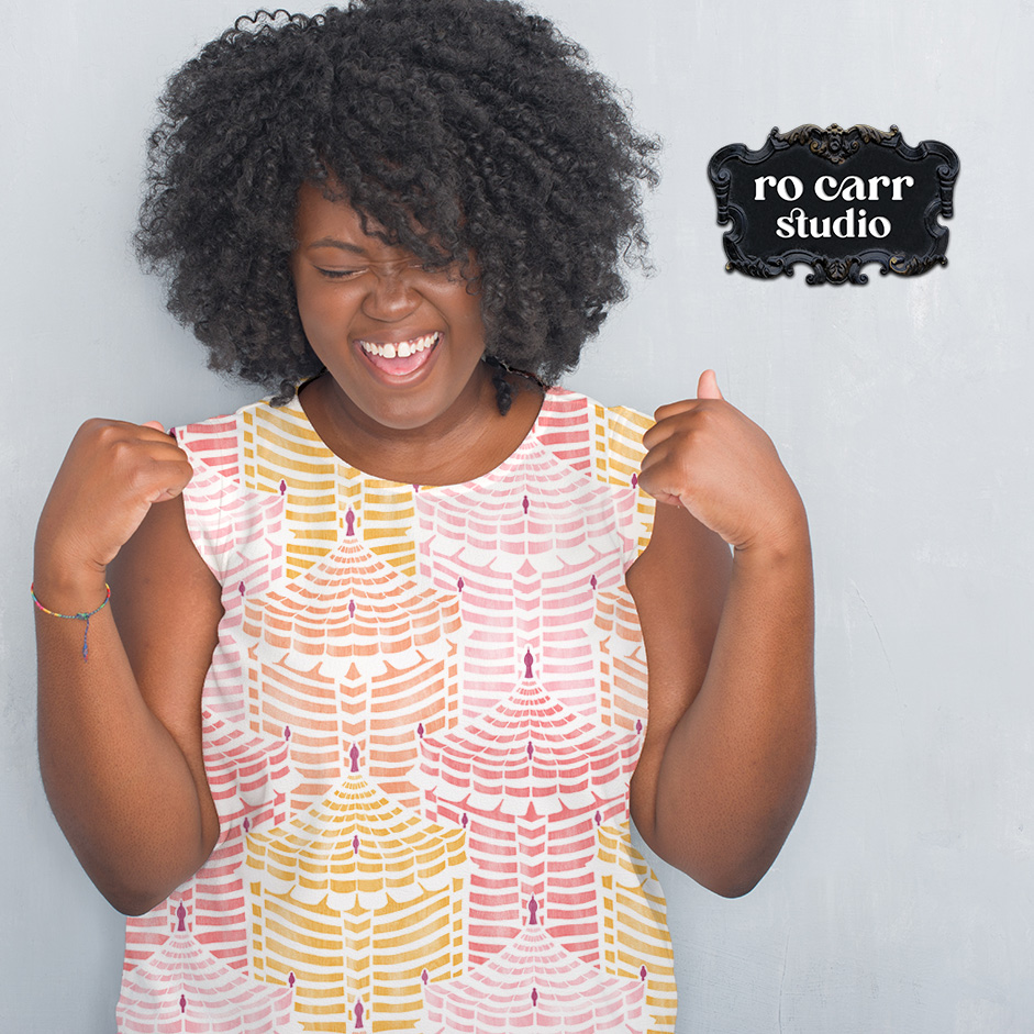 Woman laughing in a ruffled Cabana Republic tee shirt, Cotton Candy colorway.