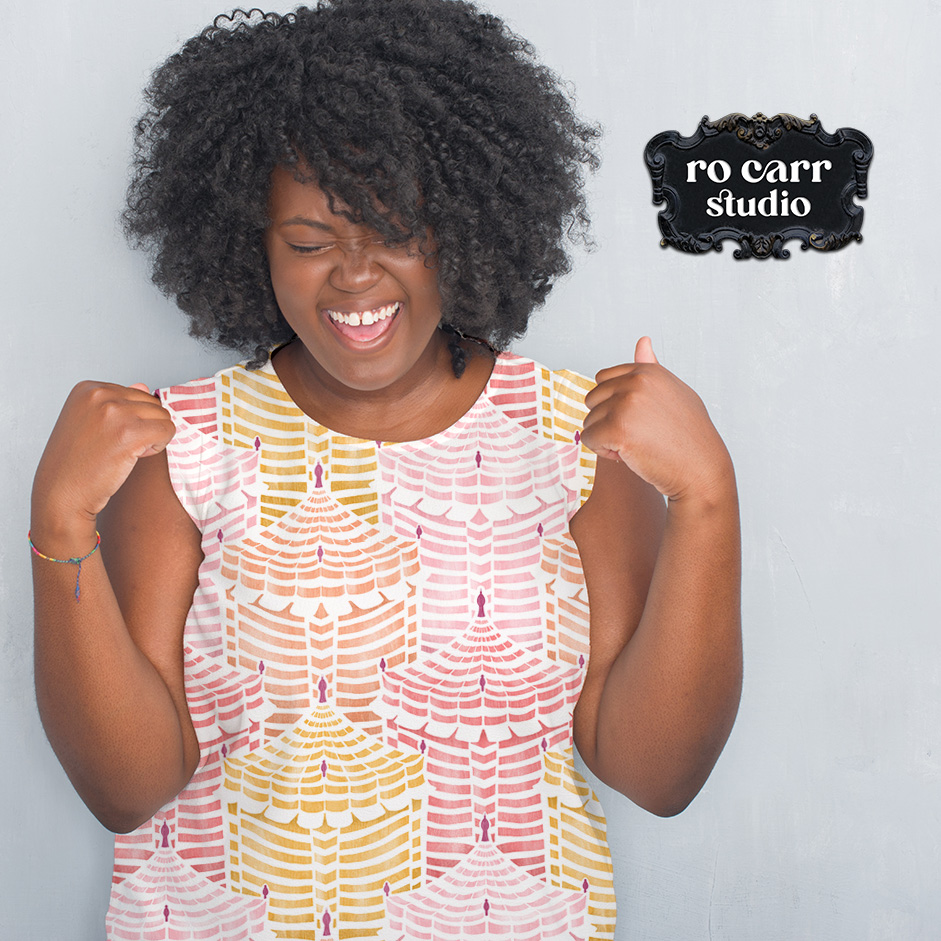 Woman laughing in a ruffled Cabana Republic tee shirt, Cotton Candy colorway.