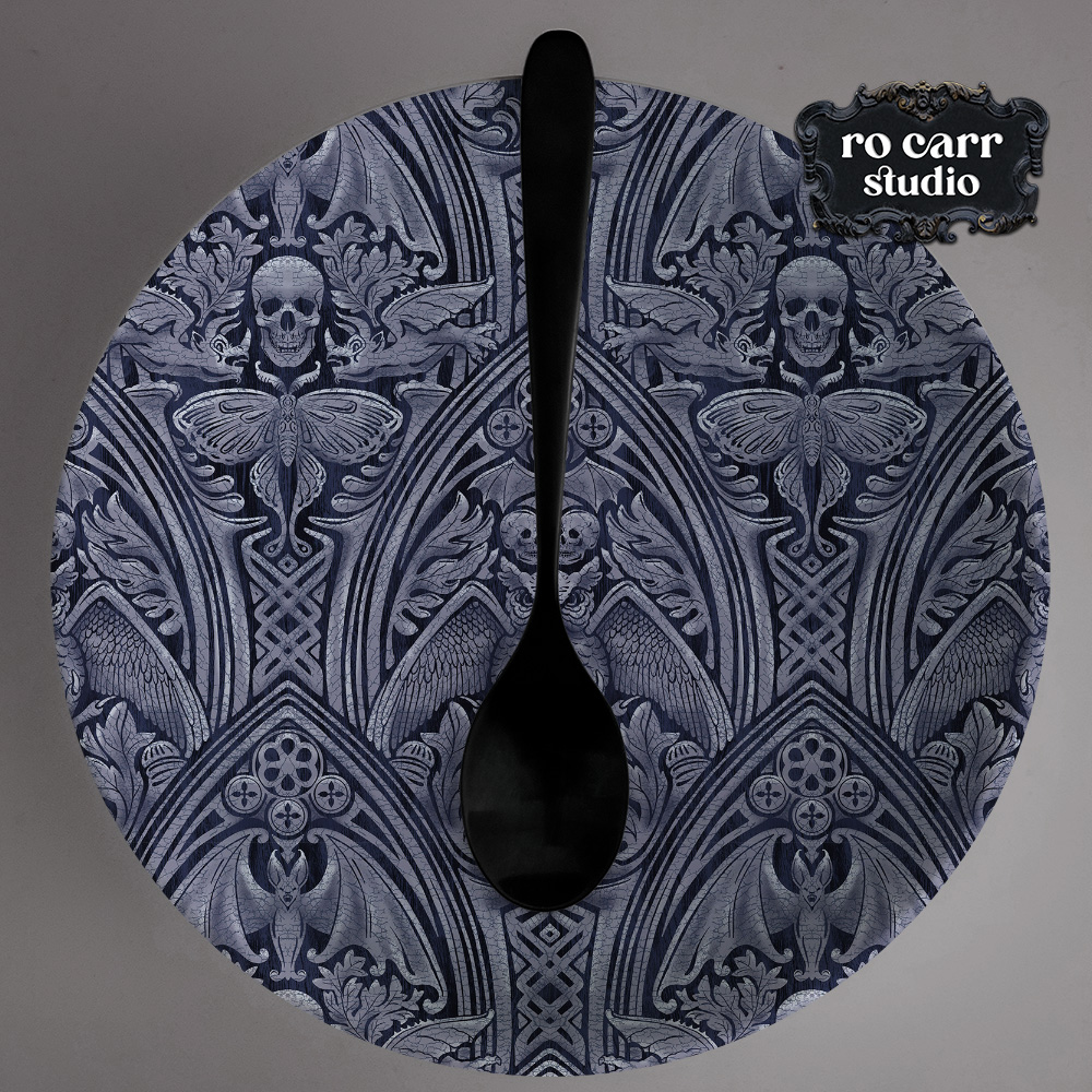 Round plate with a black serving spoon.
